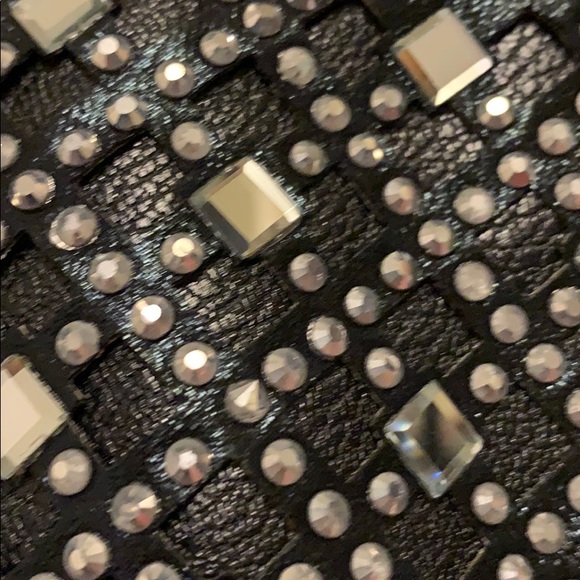 A BLACK THIN BAG WITH SEQUINS COVERING THE FRONT - Picture 4 of 4